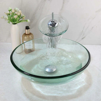 Elegant Blue Glass Vessel Sink Ensemble with Waterfall Faucet..