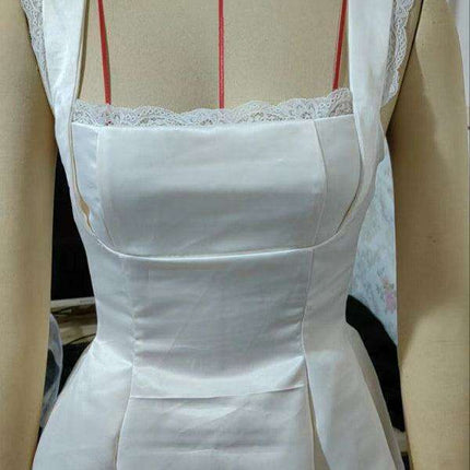 Elegant Bow-Detail Square Neck Swing Dress - Flattering and Versatile Fashion Piece - Très Elite