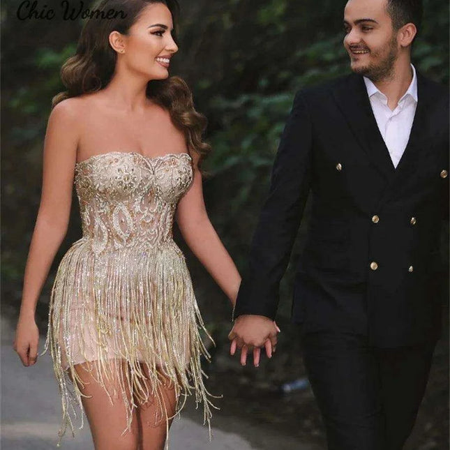 Elegant Champagne Strapless Gown with Crystal Accents and Trendy Tassels