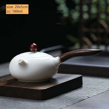 Elegant Dehua White Porcelain Teapot with Built-in Filter - Travel-Friendly Chinese Tea Set for Home and Adventure - Très Elite