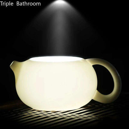 Elegant Dehua White Porcelain Teapot with Built-in Filter - Travel-Friendly Chinese Tea Set for Home and Adventure - Très Elite