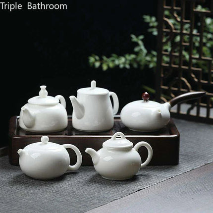 Elegant Dehua White Porcelain Teapot with Built-in Filter - Travel-Friendly Chinese Tea Set for Home and Adventure - Très Elite