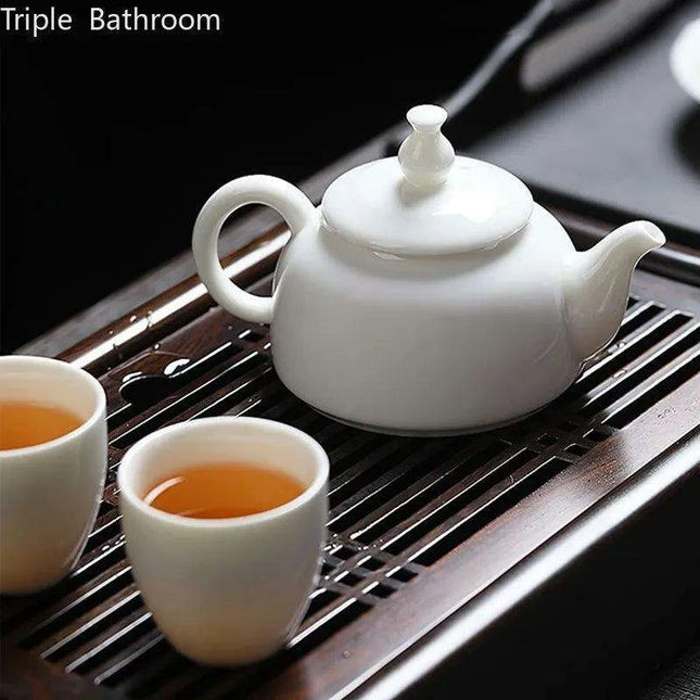 Elegant Dehua White Porcelain Teapot with Built-in Filter - Travel-Friendly Chinese Tea Set for Home and Adventure - Très Elite