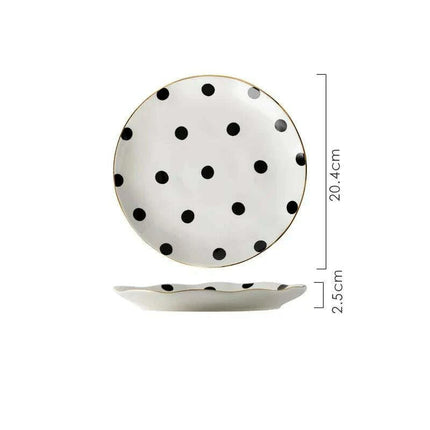 Elegant Gold-Trimmed Polka Dot Ceramic Dining Set for Sophisticated Entertaining..