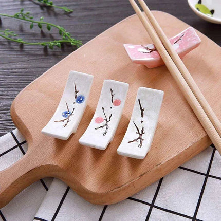 Elegant Japanese Plum Blossom Ceramic Chopstick Rest for Stylish Dining - Très Elite