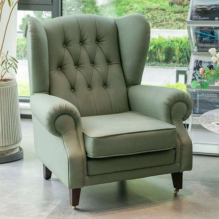 Elegant Leather Wingback Chair for Modern Living Areas..