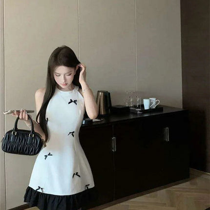 Elegant Off-Shoulder A-Line Mini Dress with Bow Detail and Ruffled Hem - Ideal for Summer Festivities - Très Elite