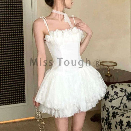 Elegant Off-Shoulder Ruffled Summer Dress with Functional Zipper and Lace-Up Accents for Women - Très Elite