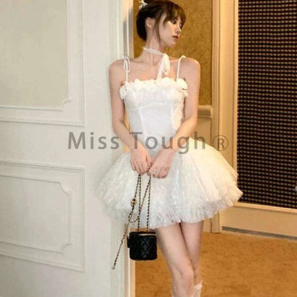 Elegant Off-Shoulder Ruffled Summer Dress with Functional Zipper and Lace-Up Accents for Women - Très Elite