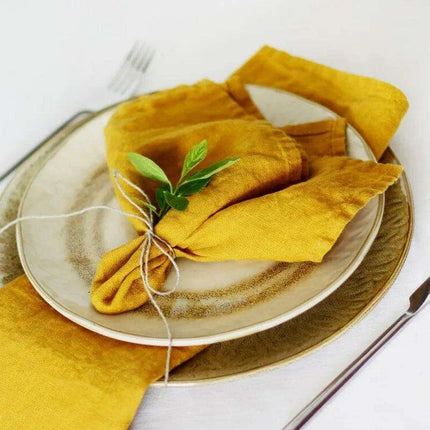 Elegant Pumpkin-Hued Linen Napkins for Upscale Dining Affairs..