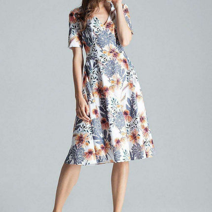Elegant Sweetheart Midi Dress with Practical Side Pockets - Très Elite
