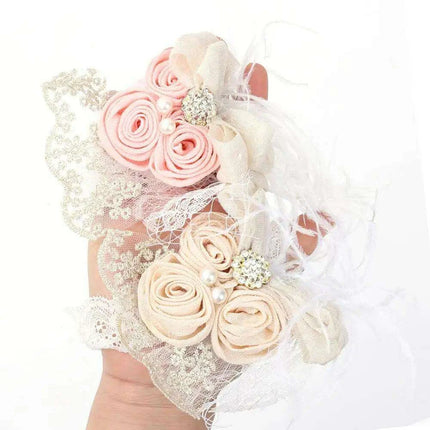 Elegant Vintage Baby Headband with Satin Flower, Feather, and Pearl Details - Très Elite