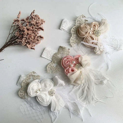 Elegant Vintage Baby Headband with Satin Flower, Feather, and Pearl Details - Très Elite