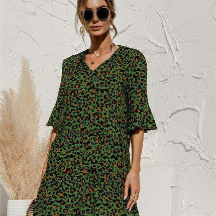 Enchanting Floral V-Neck Maxi Dress with Elegant Trumpet Sleeves and Delightful Cake Accents