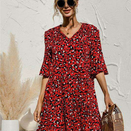 Enchanting Floral V-Neck Maxi Dress with Elegant Trumpet Sleeves and Delightful Cake Accents