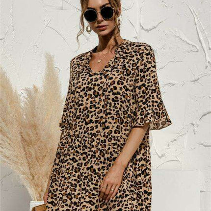 Enchanting Floral V-Neck Maxi Dress with Elegant Trumpet Sleeves and Delightful Cake Accents