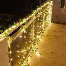 Ethereal Vine Wonderland: Premium Faux Rattan Garland with LED Illuminated Leaves - Très Elite