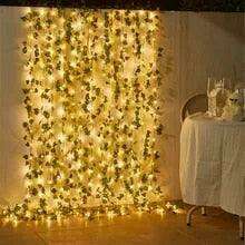 Ethereal Vine Wonderland: Premium Faux Rattan Garland with LED Illuminated Leaves - Très Elite