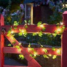 Ethereal Vine Wonderland: Premium Faux Rattan Garland with LED Illuminated Leaves - Très Elite