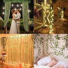 Ethereal Vine Wonderland: Premium Faux Rattan Garland with LED Illuminated Leaves - Très Elite