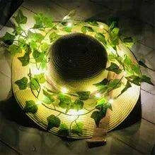 Ethereal Vine Wonderland: Premium Faux Rattan Garland with LED Illuminated Leaves - Très Elite