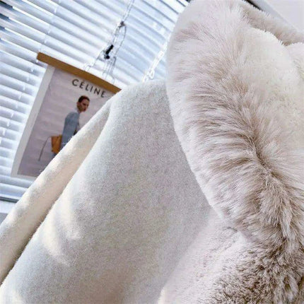 Fabulous Fur-Trimmed Batwing Poncho for Trendsetting Women - Très Elite