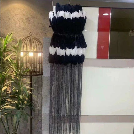 Feathered Elegance Strapless Evening Dress: A Showstopper for Nighttime Events - Très Elite