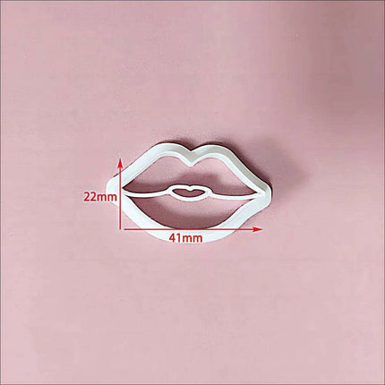 Festive Creations Earring Mold: Design Playful Red Lips & Enchanting Christmas House Shapes.