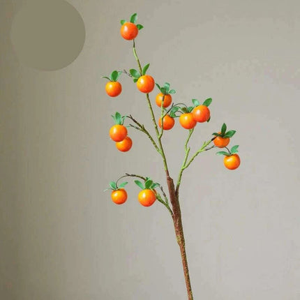 Festive Red Pomegranate Floral Branch with Lush Greenery..