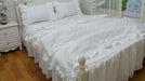 Luxurious White Cotton Bedding Set with Elegant Lace Details and Embroidered Ruffles
