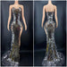 Shimmering Silver Evening Gown with Sleeveless Style and Dramatic Train