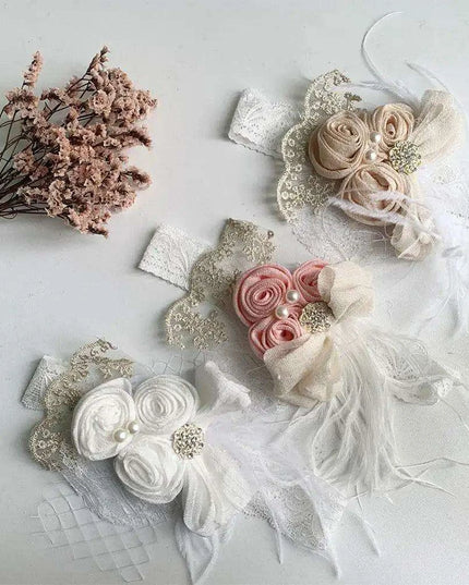 Elegant Vintage Baby Headband with Satin Flower, Feather, and Pearl Details