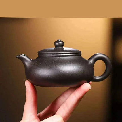 Handcrafted 140ml Yixing Purple Clay Teapot - Exquisite Zisha Kettle for Passionate Tea Aficionados - Très Elite
