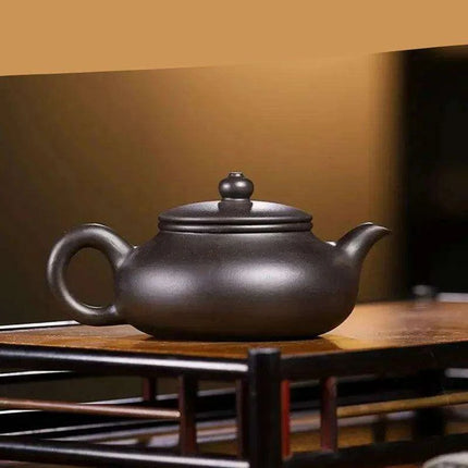 Handcrafted 140ml Yixing Purple Clay Teapot - Exquisite Zisha Kettle for Passionate Tea Aficionados - Très Elite