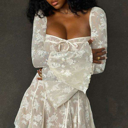 Luxe Lace-Trimmed Strappy Dress with Sophisticated Long Sleeves - Très Elite