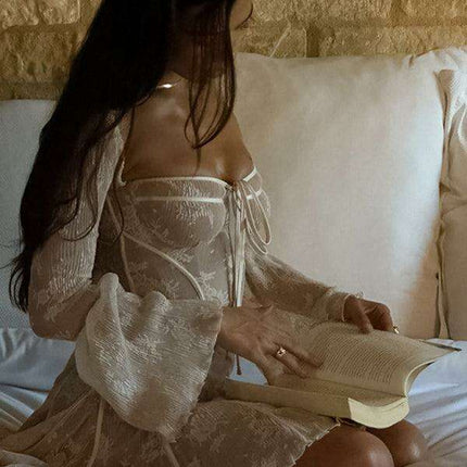 Luxe Lace-Trimmed Strappy Dress with Sophisticated Long Sleeves - Très Elite