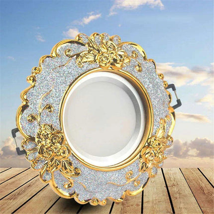 Luxurious Gold Resin Ceiling Fixture with Stylish Integrated Spotlights..