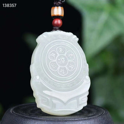 Natural White Hetian Jade Guanyin Pendant Necklace for Peace and Prosperity - Très Elite