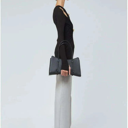 O-neck Knitted Sweater with Chic Cut-Out Details - Très Elite