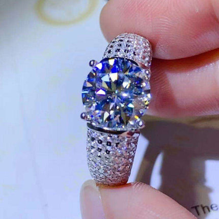 Radiant 3 Carat Moissanite and Platinum Accented Sterling Silver Ring..