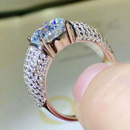 Radiant 3 Carat Moissanite and Platinum Accented Sterling Silver Ring..