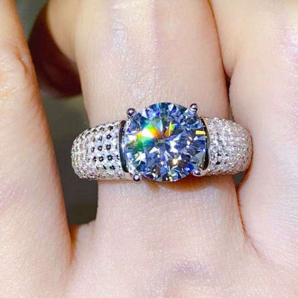 Radiant 3 Carat Moissanite and Platinum Accented Sterling Silver Ring..