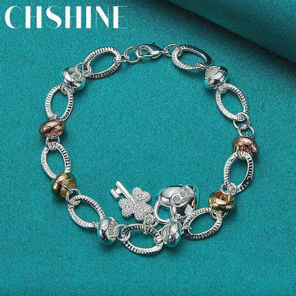 Radiant 925 Sterling Silver Heart Lock Clover Bracelet with Dazzling Zircon Stones - Très Elite