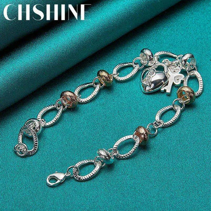 Radiant 925 Sterling Silver Heart Lock Clover Bracelet with Dazzling Zircon Stones - Très Elite