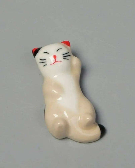 Playful Cat Cutlery and Chopstick Holder for a Whimsical Kitchen