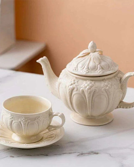Sophisticated Tea Set: Handcrafted Ceramic Teapot and Mugs Ensemble