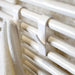 Efficient White PVC Radiator Coat Hooks: Space-Saving Bathroom Organizer - Stylish and Functional
