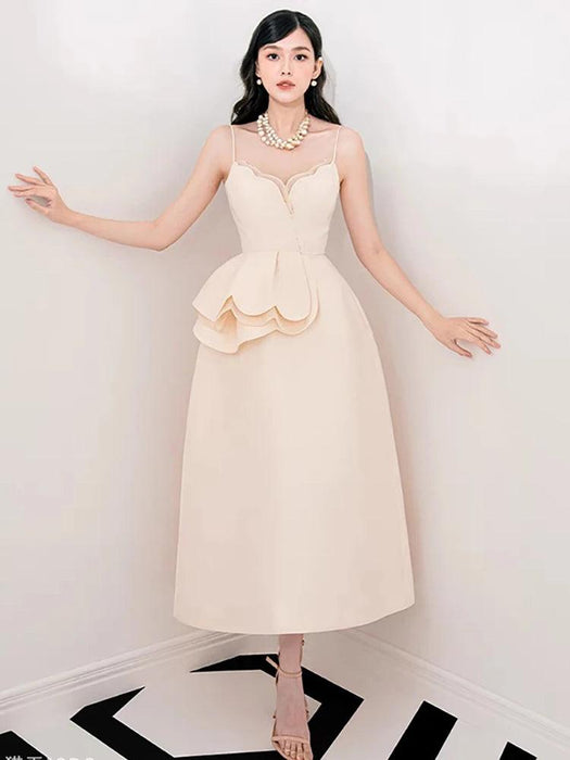 Elegant Apricot Velvet A-Line Slip Dress with Wave Hem Detail