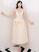 Elegant Apricot Velvet A-Line Slip Dress with Wave Hem Detail