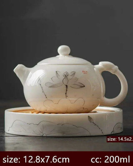 Artisan Xishi Tea Experience: Exquisite Hand-Painted Teapot Set with Premium Filter